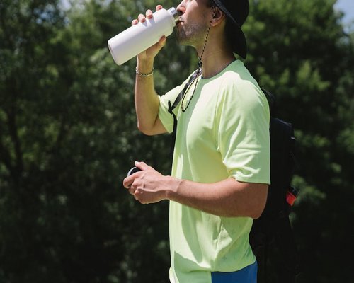 Man drinking water healthy hydration